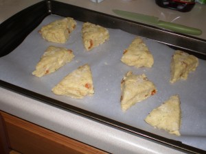raw scones on pan